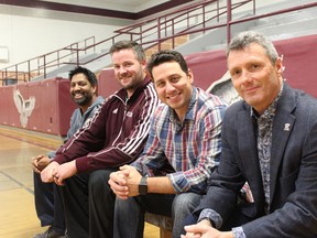 From left, Suche James, Duncan Cowan, Jason Wimmer and Pat Grew, the four men behind the successful boys basketball program at Frontenac Secondary School, home of the Falcons. (Charlie Pinkerton/For The Whig-Standard)