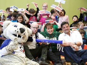 Howler, Michael Cullen, Executive Director of United Way Centraide, St. David's, Principal Dawn-Marie Wemigwans and Dario Zulich, owner of the Sudbury Wolves along with St-David's Catholic Elementary School students pose for a photo at a press conference in Sudbury, Ont. on Wednesday January 25, 2017.  in spirit of "Bell Let's Talk Day"United Way Centraide Sudbury and/et Nipissing Districts and the Sudbury Wolves officially announcedtheir philanthropic partnership with the launch of the"Wolves United" fund, which will support local youth development and youth mental healthservices. Gino Donato/Sudbury Star/Postmedia Network