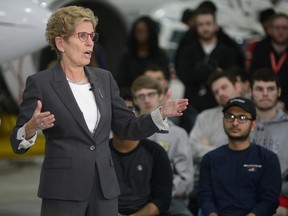 Ontario Premier Kathleen Wynne has a town hall meeting with students at the Fanshawe College Aviation Centre in London, Ont. Tuesday, January 24, 2017. (MORRIS LAMONT/POSTMEDIA NETWORK)