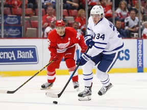 Maple Leafs forward Auston Matthews carries the puck against the Red Wings in Detroit on Wednesday night. (The Associated Press)