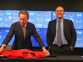 Eugene Melnyk, left, announces that Tom Anselmi is the new CEO and President of the Ottawa Senators on Jan. 25, 2017. (Jean Levac/Postmedia)