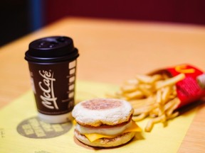 A McDonald's Egg McMuffin, french fries and a coffee are shown in a handout photo. Two major fast-food chains in Canada say they will start serving all-day breakfast at the majority of their restaurants next month. Canadians hankering for an Egg McMuffin at night will be able to satisfy that craving starting Feb. 21, when McDonald's Canada extends its breakfast hours until close at about 1,100 of its 1,450 restaurants. THE CANADIAN PRESS/HO-McDonald's Canada