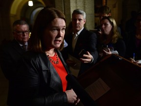 Jane Philpott, Federal Minister of Health and Ralph Goodale talks to media after making an announcement regarding an act to amend the Controlled Drugs and Substances Act and to make related amendments to other Acts during a press conference in the foyer of the House of Commons on Parliament Hill in Ottawa on Monday, Dec. 12, 2016. THE CANADIAN PRESS/Sean Kilpatrick