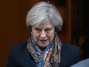 British Prime Minister Theresa May leaves 10 Downing Street in central London on January 24, 2017. (DANIEL LEAL-OLIVAS/AFP/Getty Images)