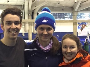 Ottawa's Isabelle Weidemann, centre, competed on the Calgary Olympic Oval ice during national-level long-track speed skating competitions with her brother Jake, left, and sister Lily. (Laurel Rockwell)