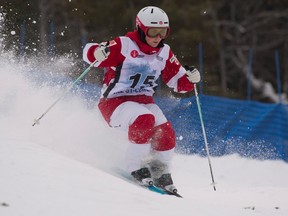 Andi Naude races down the hill in the women's freestyle moguls World Cup on Jan. 21, 2017 in St-Come Que. (THE CANADIAN PRESS/Jacques Boissinot)