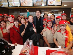 Prime Minister Justin Trudeau visits with staff at a local restaurant in Winnipeg, Thursday, January 26, 2017. Trudeau spent the day in Winnipeg as part of his cross-country tour. THE CANADIAN PRESS/John Woods