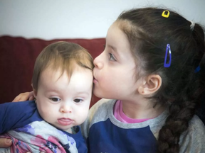Six-year-old Lamitta El-Roz says she wants to be able play with her eight-month-old sister Leandra. Ashley Fraser/Postmedia