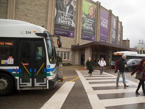 The traffic circle outside Alumni Hall in London, often has several buses and students crossing. The future rapid bus route would go through this point as envisioned today. (MIKE HENSEN, The London Free Press)