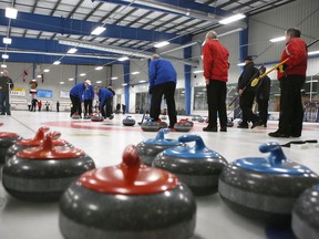 Curlers from eastern Ontario and New York State take part on the opening day of the 84th Whig-Standard Bonspiel at Royal Kingston Curling Club on Thursday. (Elliot Ferguson/The Whig-Standard)