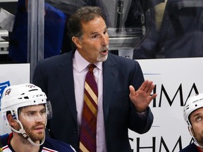 In this Nov. 13, 2015, file photo, Columbus Blue Jackets' John Tortorella gives instructions during the third period of an NHL hockey game against the Pittsburgh Penguins, in Pittsburgh. (AP Photo/Gene J. Puskar, File)