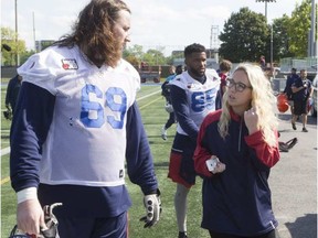 "The best way to learn is to go out there and do it," says Montreal Alouettes assistant GM Catherine Raîche, speaking with Jacob Ruby following Alouettes practice on Sept. 28, 2016. (Postmedia)