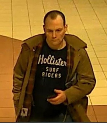 Security camera image of released by Toronto Police in a Jan. 12 break and enter at a Queen and Bay Sts. business. Justin Yates, 39, is charged.