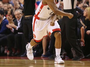 Toronto Raptors guard Kyle Lowry celebrates during an NBA game against the Atlanta Hawks at the Air Canada Centre on Dec. 16, 2016. (Stan Behal/Toronto Sun/Postmedia Network)