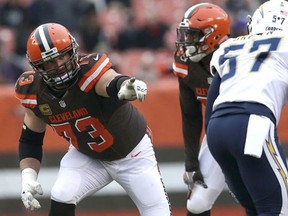 Cleveland Browns' Joe Thomas gestures at the line of scrimmage during an NFL football game against the San Diego Chargers in Cleveland. (AP Photo/Aaron Josefczyk, File)