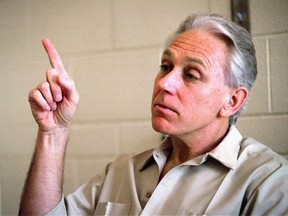 In this March 1, 1995 file photo, Jeffrey MacDonald gestures at the federal correctional institution in Sheridan, Ore. A three-judge panel of the 4th U.S. Circuit of Appeals heard arguments Thursday, Jan. 26, 2017, in the case of  MacDonald, who inspired the book and television miniseries "Fatal Vision." An attorney for the former Army surgeon convicted of killing his pregnant wife and their two daughters nearly 50 years ago says the man won't give up his fight to prove he is innocent. (AP Photo/Shane Young)