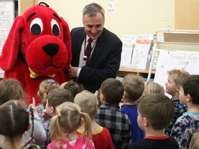 BRUCE BELL/The Intelligencer
Bay of Quinte MP Neil Ellis and Clifford the Big Red Dog were at St. Gregory Catholic School for Family Literacy Day on Friday. Here they are pictured in Mrs. Leavitt's Kindergarten class.