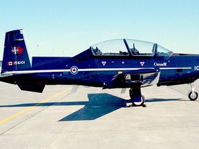 A CT- 156 Harvard II trainer aircraft sits on the tarmac at CFB Moose Jaw, Saskatchewan on March 15, 2006. (THE CANADIAN PRESS/ho-Department of National Defence)
