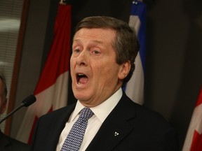 Toronto Mayor John Tory responds to Premier Kathleen Wynne's announcement about knocking out his proposed road tolls initiative on Friday, January 27, 2017. (Jack Boland/Toronto Sun)