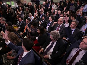 Members of the media raise their hands to ask questions during a daily briefing conducted by White House Press Secretary Sean Spicer at the James Brady Press Briefing Room of the White House January 23, 2017 in Washington, DC. (Getty Images)