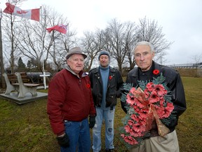 Larry Laur, left, Jerry Shearing and Nick Sauter are among those trying to get the city?s OK for their grassroots Vimy Memorial Park on the southeast corner of the Hale-Trafalgar roundabout. (MORRIS LAMONT, The London Free Press)