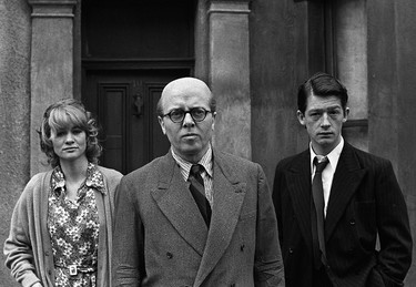 In this May 17, 1970 file photo, British actor Richard Attenborough, centre, who portrays mass murderer John Reginald Christie in the lead role of "10 Rillington Place" stands alongside John Hurt, right, and Judy Geeson in London, England. (AP Photo/Bob Dear, File)