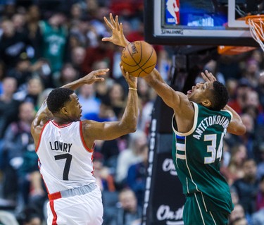 Toronto Raptors Kyle Lowry during 2nd half action against Milwaukee Bucks Giannis Antetokounmpo at the Air Canada Centre in Toronto, Ont. on Friday January 27, 2017. Ernest Doroszuk/Toronto Sun/Postmedia Network