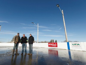 (Left to right) Dean Vestby, Joel Hein and Trent Kenyon, pose for a photo on the unfinished ice rink in Kingman on Thursday, January 26, 2017. Each are supporters of the Rink Of Dreams project that is constructing a NHL sized rink in the rural community. Ian Kucerak / Postmedia