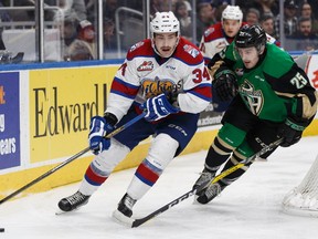 Edmonton's Graham Millar (left) battles Prince Albert's Sean Montgomery during the second period of a WHL game between the Edmonton Oil Kings and the Prince Albert Raiders at Rogers Place in Edmonton on Saturday, January 21, 2017.