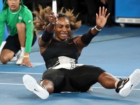 Serena Williams celebrates after defeating her sister Venus in the final at the Australian Open in Melbourne Saturday, Jan. 28, 2017. (AP Photo/Aaron Favila)