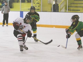 Vulcan peewee Hawks forward Beau Gardner shoots the puck during a game against the Okotoks Oilers Friday evening at the Vulcan and District Arena.