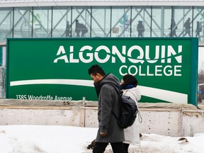 Students walk on the Woodroffe campus of Algonquin College in Ottawa on January 23, 2017. (Errol McGihon/Postmedia Network)