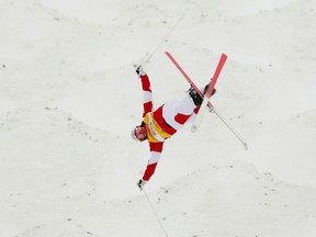 Mikael Kingsbury of Canada flies through the air during the Men's Moguls finals at the 2017 FIS Freestyle Ski World Cup in Calgary on Jan. 28, 2017. (THE CANADIAN PRESS/Todd Korol)
