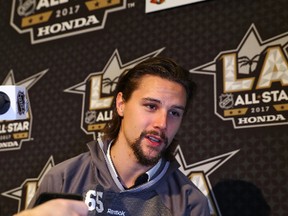 Senators captain Erik Karlsson speaks to the media at the NHL all-star weekend yesterday. (GETTY IMAGES)