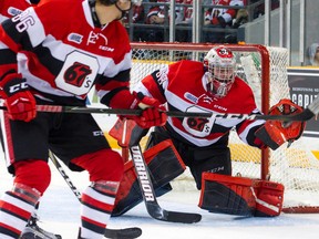 Ottawa 67’s goalie Olivier Lafreniere makes a save against the Niagara Ice Dog’s yesterday. (ASHLEY FRASER/Postmedia Network)