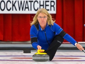 Skip Shannon Kleibrink throws a rock during the Autumn Gold Curling Classic at the Calgary Curling Club in Calgary, Alta., on Friday, Oct. 9, 2015. It was the 38th year for the event. Lyle Aspinall/Postmedia