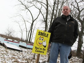 Reg Lumley has installed security to help protect his bee hives. Thieves have been targetting his hives and honey at a Churchill Line location, and he's looking for help from the public to track down the hives and the perpetrators. Tyler Kula/Sarnia Observer/Postmedia Network