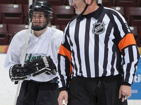 Don Van Massenhoven referee a charity hockey game between Lambton Ontario Provincial Police officers and Lambton College police foundations students at Progressive Auto Sales Arena on Sunday, Jan. 29, 2017 in Sarnia, Ont. Van Massenhoven, a 56-year-old Strathroy resident, is a former Lambton OPP officer. (Metcalfe Photography)