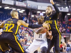 Kirk Williams Jr. of the Niagara River Lions runs into a wall in Royce White of the London Lightning during their NBL of Canada game  at the Meridian Centre in St. Catharines on Sunday. The Lightning completed a weekend sweep of the Lions with a 117-89 win. (Julie Jocsak/Postmedia News)