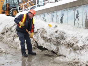 City crews clear snow and ice from catch basins around Greater Sudbury. (John Lappa/Sudbury Star file photo)