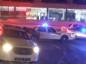 A screenshot of police vehicles at the scene of a shooting at the Centre Culturel Islamique de Québec on Sunday night, Jan. 29, 2017, was taken from a live video posted to the mosque's Facebook page.