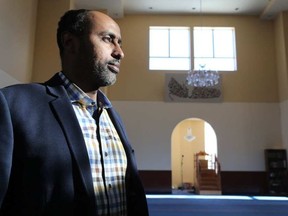 Abdourahman Kahin, a member of the board of directors for the Outaouais Islamic Centre in Gatineau, reflects on the shootings in Quebec City. WAYNE CUDDINGTON / POSTMEDIA