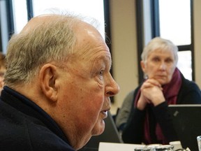 Luke Hendry/The Intelligencer
South East LHIN directors Jack Butt and Maribeth Madgett take part in a discussion during a board meeting Monday in Belleville. Madgett expressed concern about patients' inability to provide family doctors despite using a provincial system.