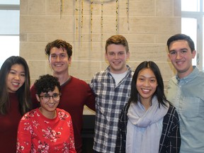 MTW (from left, Julie Tran, Aniqah Mair and Landon Wilcock) and JBP (from third from left, Brian Mackay, Jenn Li and Palmer Lockridge) are the two groups running for election to Queen's University Alma Mater Society. (Charlie Pinkerton/For The Whig-Standard)