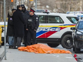 Police at the scene of a murder on George St. (ERNEST DOROSZUK, Toronto Sun)