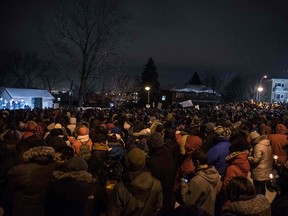 People attend a rally near the Islamic cultural centre in Quebec City on Jan. 30, 2017. ALICE CHICHE/AFP/Getty Images