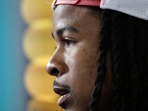 Falcons' Devonta Freeman answers questions during opening night for Super Bowl LI at Minute Maid Park in Houston on Monday, Jan. 30, 2017. (Charlie Riedel/AP Photo)