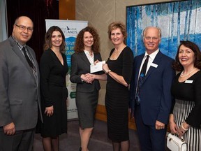 Peter Crockett, Jessica Jaremchuk, Donna Barclay, Dr. Karla Guyn, Phil Holst and Lynette Mader (from left to right) during a cheque presentation at a Ducks Unlimited event in Toronto. The grant will be used to help the Thames River Wetland Restoration Project. (Submitted)
