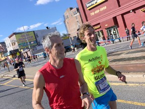 Ary Tsotras (left) runs with Achilles Canada guide Rob Whitmill.  (Photo submitted)