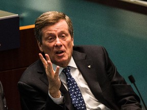 Mayor John Tory moves to shelve private garbage collection east of Yonge St. at council in Toronto on Tuesday January 31, 2017. (Craig Robertson/Toronto Sun)